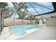 View of the screened-in pool area with nice sky at 6220 Murdock Ave, Sarasota, FL 34231