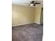 This bedroom features neutral walls and soft carpet flooring at 6252 Olivedale Dr, Riverview, FL 33578