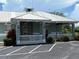 Charming clubhouse featuring attractive landscaping and dedicated parking spaces at 6252 Olivedale Dr, Riverview, FL 33578