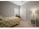 Charming bedroom features natural light and wood-look tile flooring, complemented by vintage-style furniture at 6408 Seasound Dr, Apollo Beach, FL 33572
