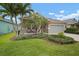Charming single-story home with a well-manicured lawn and a cozy front porch and a two car garage at 6408 Seasound Dr, Apollo Beach, FL 33572