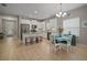 Bright kitchen with stainless steel appliances, granite countertops, ample cabinet space, and an eat-in area at 6408 Seasound Dr, Apollo Beach, FL 33572