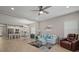 Open-concept design connects the living room and kitchen, creating a spacious and inviting atmosphere at 6408 Seasound Dr, Apollo Beach, FL 33572