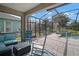 Inviting screened-in pool area with comfortable seating and a relaxing spa at 6408 Seasound Dr, Apollo Beach, FL 33572