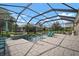 Beautiful pool and spa area enclosed in a screen with ample patio space for entertaining at 6408 Seasound Dr, Apollo Beach, FL 33572