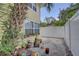 Side yard area with privacy fence, great for gardening or outdoor entertaining at 659 26Th S Ave, St Petersburg, FL 33705