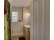 Bathroom view features a new vanity with neutral paint and decor at 659 26Th S Ave, St Petersburg, FL 33705