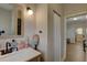 Bathroom view features new vanity, with adjacent shower and entrance into the living area at 659 26Th S Ave, St Petersburg, FL 33705