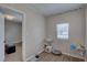 Neutrally painted bedroom features durable laminate flooring, and an adjacent room view at 659 26Th S Ave, St Petersburg, FL 33705