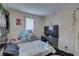Bedroom with window unit and light colored walls at 659 26Th S Ave, St Petersburg, FL 33705