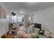 Bright living room with lots of natural light and wood-look laminate flooring at 659 26Th S Ave, St Petersburg, FL 33705