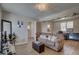 Comfortable living room with natural light, laminate flooring and neutral colored walls at 659 26Th S Ave, St Petersburg, FL 33705