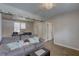 Cozy living room with natural light, neutral walls, and light laminate flooring at 659 26Th S Ave, St Petersburg, FL 33705