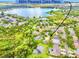 Aerial view of property at 6804 Pleasant Oaks Place near a lake and community pool at 6804 Pleasant Oaks Pl, Riverview, FL 33578