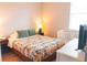 Bedroom featuring a cozy bed and a crib at 6804 Pleasant Oaks Pl, Riverview, FL 33578