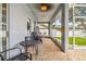 Covered lanai featuring comfortable seating, perfect for outdoor relaxation at 6804 Pleasant Oaks Pl, Riverview, FL 33578