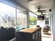 Outdoor patio with dining and seating areas, adjacent to the pool at 6804 Pleasant Oaks Pl, Riverview, FL 33578