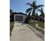 Backyard featuring lush landscaping, and outdoor dining area at 740 7Th Sw Ave, Largo, FL 33770