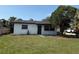 Charming home featuring a well-maintained lawn and inviting curb appeal at 740 7Th Sw Ave, Largo, FL 33770