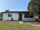 Charming home featuring a well-maintained lawn and inviting curb appeal at 740 7Th Sw Ave, Largo, FL 33770