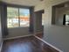 This dining room features a large window and an opening that leads to the kitchen at 740 7Th Sw Ave, Largo, FL 33770