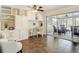 Cozy home office with custom built-ins and sliding glass doors that offers a serene workspace with natural light at 7511 Laurel Oak Ct, Port Richey, FL 34668