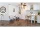 Bright home office featuring custom built-ins, providing ample storage and workspace, perfect for a productive environment at 7511 Laurel Oak Ct, Port Richey, FL 34668