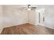 View of the bedroom leading into the bathroom with tile floors at 8720 Briar Patch Dr, Port Richey, FL 34668