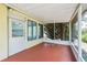 The patio features a screened in area, and leads to the backyard at 8720 Briar Patch Dr, Port Richey, FL 34668