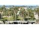 Beautiful community view with palm trees, water views and lovely architecture at 880 Mandalay Ave # C412, Clearwater Beach, FL 33767