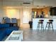 Cozy kitchen area featuring granite counters, and a breakfast bar at 880 Mandalay Ave # C412, Clearwater Beach, FL 33767