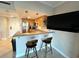 Functional kitchen and breakfast bar area, perfect for casual dining and entertaining at 880 Mandalay Ave # C412, Clearwater Beach, FL 33767