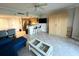 Open living space showcasing the breakfast bar, seating area and a murphy bed at 880 Mandalay Ave # C412, Clearwater Beach, FL 33767