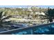 Image shows a parking area shaded by trees, providing convenient parking spots at 880 Mandalay Ave # C412, Clearwater Beach, FL 33767
