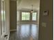 Bedroom featuring trey ceiling, ceiling fan, and a large window with a view at 1008 Arista Blvd, Valrico, FL 33594
