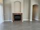 Living room featuring a fireplace and archways at 1008 Arista Blvd, Valrico, FL 33594