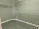 Walk-in closet equipped with wire shelving for maximized storage and organization at 1008 Arista Blvd, Valrico, FL 33594