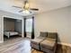 This bedroom features hardwood floors, ceiling fan and a bonus room at 10206 Evening Trail Dr, Riverview, FL 33569