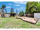 Spacious backyard with a charming deck and verdant greenery, creating a perfect outdoor retreat at 10549 112Th Ave, Largo, FL 33773