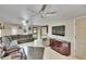 Large, naturally lit living room featuring ceiling fans, comfortable seating and tile flooring at 10549 112Th Ave, Largo, FL 33773