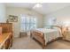 Cozy bedroom with lots of natural light and soft, comfortable decor at 10728 Moshie Ln, San Antonio, FL 33576