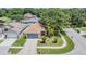 Overhead view of a well-kept residential area with trees and sidewalks at 11022 Connacht Way, Tampa, FL 33610