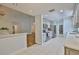 Open kitchen area with tile flooring, stainless steel appliances, and seamless access to the living room at 1112 Mcdaniel St # 78, Sun City Center, FL 33573