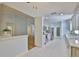 Open kitchen area with tile flooring, stainless steel appliances, and seamless access to the living room at 1112 Mcdaniel St # 78, Sun City Center, FL 33573