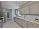 Kitchen featuring sleek countertops, stainless steel appliances, and ample cabinet space at 1112 Mcdaniel St # 78, Sun City Center, FL 33573