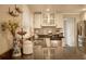 Modern kitchen with granite countertops, stainless steel appliances and beadboard ceiling at 13637 13Th St, Dade City, FL 33525