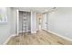 Bedroom featuring closet with shelving, wood-look tile flooring and lots of natural light at 13909 Berkowitz Ave, Hudson, FL 34667