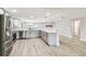 Spacious kitchen with modern appliances, marble countertops, and an open layout at 13909 Berkowitz Ave, Hudson, FL 34667