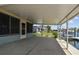 Enjoy the spacious outdoor lanai, perfect for relaxing by the waterfront at 13909 Berkowitz Ave, Hudson, FL 34667