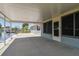 View of canal from lanai featuring a covered patio with screened door and windows at 13909 Berkowitz Ave, Hudson, FL 34667